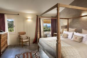 A bed or beds in a room at Petra Segreta Resort & Spa Még 37 kép
