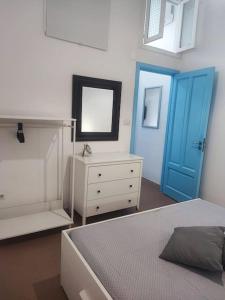 Casa Gambale al Porto tesisinde bir odada yatak veya yataklar