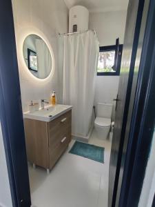Et badeværelse på Brilliance Apartments