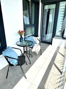 Balkon lub taras w obiekcie ŻOLI STORK APARTMENTS - Hubnera 1