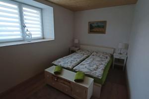 Tempat tidur dalam kamar di Sunny House