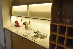 Kjøkken eller kjøkkenkrok på Furmint & Juhfark Apartmanok
