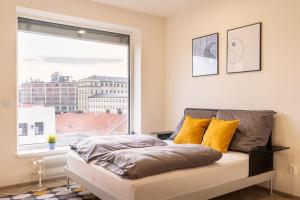 Posteľ alebo postele v izbe v ubytovaní Brno Center View Apartement A - with self check-in