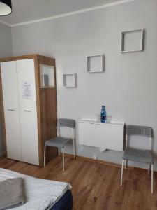 Postel nebo postele na pokoji v ubytování Pokoje Fiesta