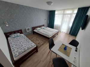 Postel nebo postele na pokoji v ubytování PartSide Balatonfüred