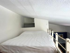 Кровать или кровати в номере Appartement à 100M de la plage - Terrasse & Parking Privé