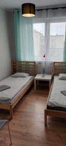 Postel nebo postele na pokoji v ubytování Pokoje Fiesta