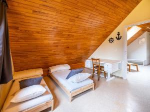 a room with a couch and a table and a desk at Villa in St-Idesbald near Sea Beach in Koksijde