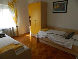 Postel nebo postele na pokoji v ubytování Apartments TERRAeSAL