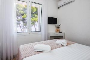 Posteľ alebo postele v izbe v ubytovaní Holiday House de Finis
