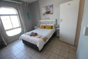 Ένα ή περισσότερα κρεβάτια σε δωμάτιο στο Seagull 511 +10 φωτογραφίες