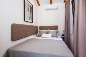 Posteľ alebo postele v izbe v ubytovaní Holiday House de Finis