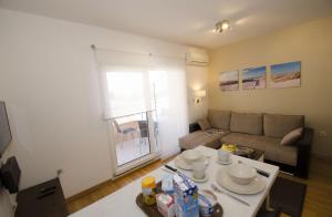 Posezení v ubytování Apartment Mala