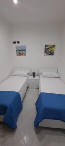 Postel nebo postele na pokoji v ubytování La casa del Vescovo