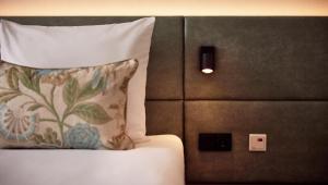Postel nebo postele na pokoji v ubytování Van der Valk Hotel Groningen Zuidbroek