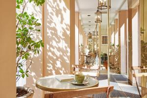 Posezení v ubytování Hotel Etoile Saint Ferdinand by Happyculture