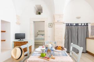 Photo de la galerie de l'établissement La Casetta Bianca by BarbarHouse, à Locorotondo