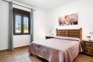 Postel nebo postele na pokoji v ubytování Casa Sonia y Nuria + 18 fotografií