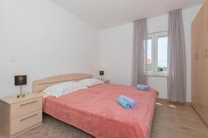 Postel nebo postele na pokoji v ubytování Holiday home Natalia