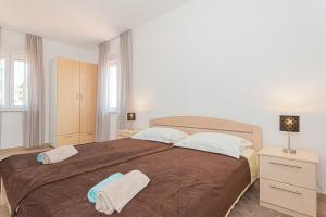 Postel nebo postele na pokoji v ubytování Holiday home Natalia