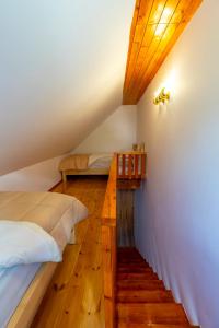 Łóżko lub łóżka w pokoju w obiekcie Gegest Hotel