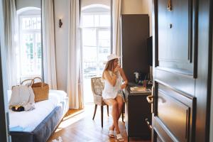 Postel nebo postele na pokoji v ubytování Allegro Neve Tzedek Boutique Suites - By HOMY