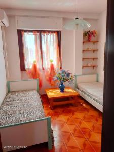 Ένα ή περισσότερα κρεβάτια σε δωμάτιο στο Room in Apartment - La Palma Etnik Room Sardinia