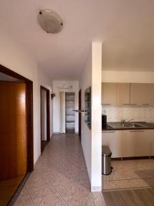 Kuchyň nebo kuchyňský kout v ubytování Apartment Lucija
