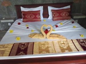 Кровать или кровати в номере La Perla Bentota