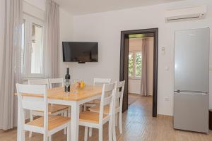 TV a/nebo společenská místnost v ubytování Holiday home Natalia