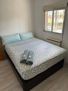 A bed or beds in a room at El gengo hostel