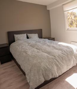 Postel nebo postele na pokoji v ubytování Modern and Central Apartment, 6 mins to Oslo City