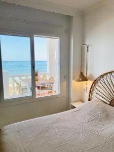 Posteľ alebo postele v izbe v ubytovaní Primera Línea de Playa Increíbles vistas