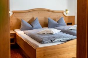Postel nebo postele na pokoji v ubytování Eibsee - Alpenblick Tilly