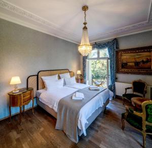Postel nebo postele na pokoji v ubytování Villa Bleichröder + 37 fotografií