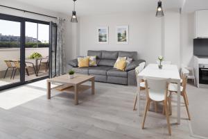 Posedenie v ubytovaní Residencial Celere Playa Niza