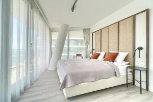 Posteľ alebo postele v izbe v ubytovaní Your Holidays Waves B862