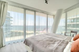 Posteľ alebo postele v izbe v ubytovaní Your Holidays Waves B862