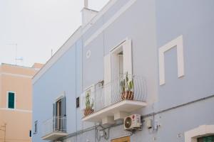 モノーポリにあるPalestro49 Holiday Houseの白い建物