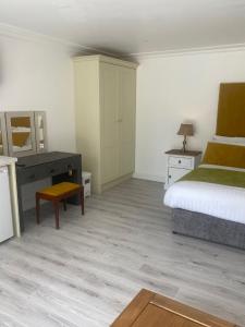 Voodi või voodid majutusasutuse St Columbs House toas