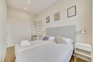 Ένα ή περισσότερα κρεβάτια σε δωμάτιο στο Apartamento Pamplona Prime by Clabao +87 φωτογραφίες