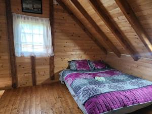 Postel nebo postele na pokoji v ubytování Planinska tišina Guest House