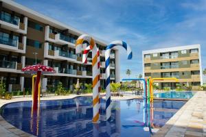 Bazén v ubytování Charmoso Estúdio em Muro Alto com Vista para piscina nebo v jeho okolí