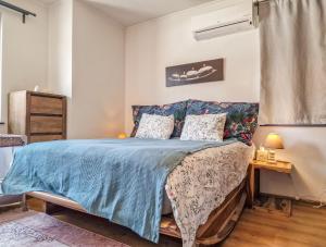 Ένα ή περισσότερα κρεβάτια σε δωμάτιο στο Pastels - 2BD in Trinity Bansko with underground parking by Flat Mаnager