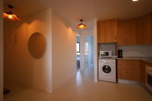 Kuchnia lub aneks kuchenny w obiekcie Campoamor Seaview