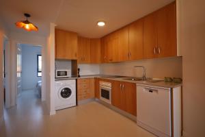 Kuchnia lub aneks kuchenny w obiekcie Campoamor Seaview