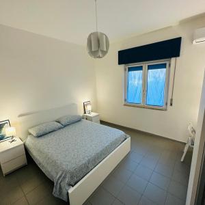 Ένα ή περισσότερα κρεβάτια σε δωμάτιο στο La casa del nonno - Villapiana