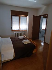 Ein Bett oder Betten in einem Zimmer der Unterkunft Albergo San Giorgio