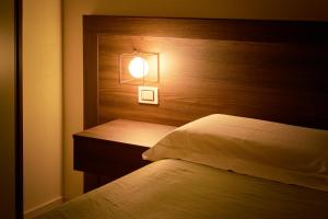 Postel nebo postele na pokoji v ubytování B&B Torre Talao