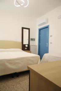 Postel nebo postele na pokoji v ubytování Casa Dalmazia
